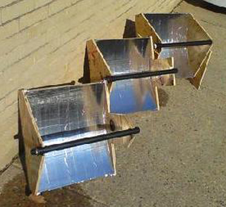 Three models of solar hot water heaters.